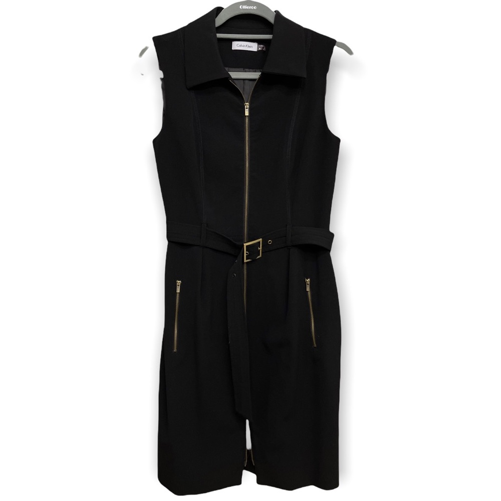 Calvin Klein Size 8, 63% Polyester 33% Rayon 4% Spandex black